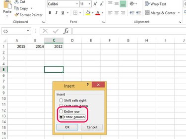 Select Entire Row or Column to add a row or column to the worksheet.