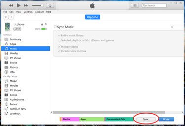 Music screen of iTunes with Sync button circled in red