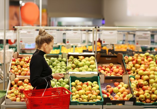 Woman buying fruits at the market