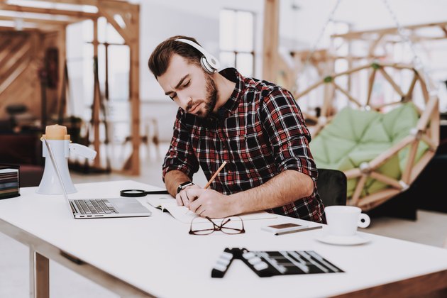 Creative Worker. Listen Music. Working. Ideas.