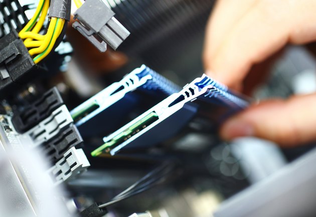 Installing RAM memory chip.
