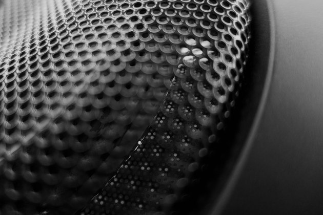 Abstract black metal speaker grid front