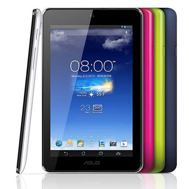 Doctor holding tablet PC talking to patient