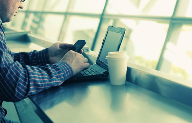 man's hands with tablet