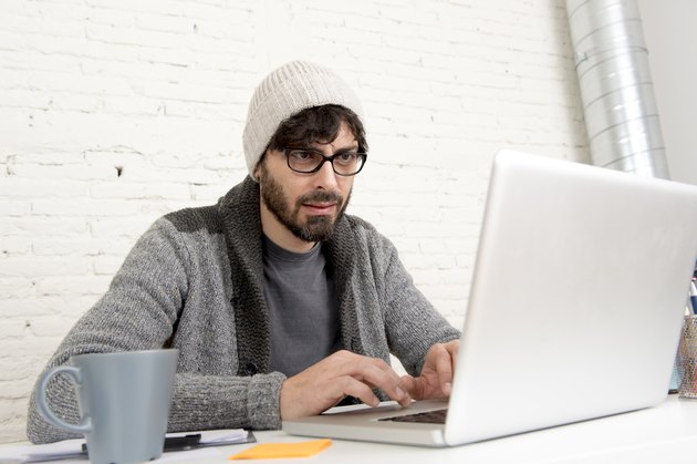 corporate portrait young hispanic hipster businessman working at office