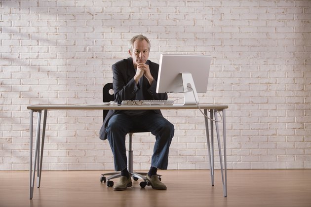 Businessman at desk with computer