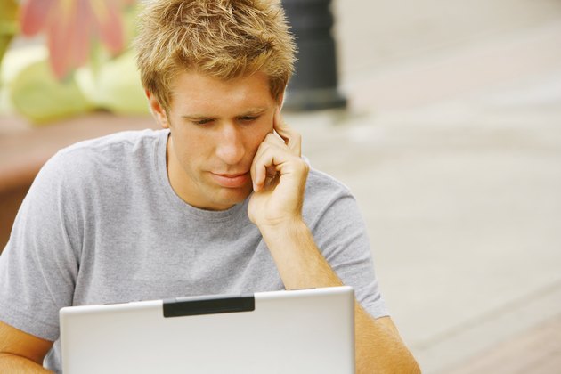 Man behind a laptop