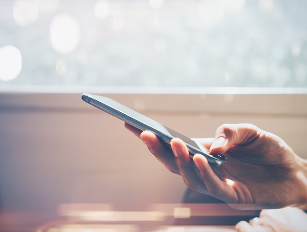 Mock up of man using smart phone in travel