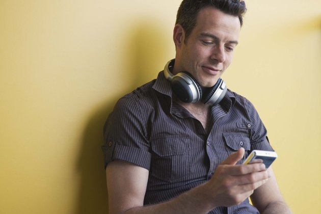 Man with digital music player
