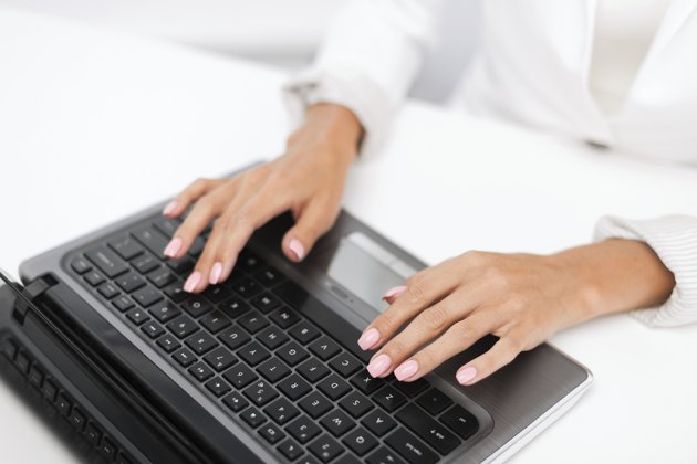 businesswoman using her laptop computer