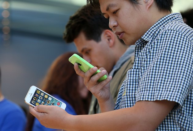 Apple's Latest iPhone Models Go On Sale Across U.S.