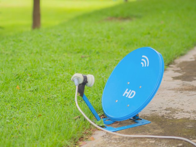 Blue Satellite is located on the cement floor.