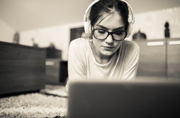 Young female blogger working at home