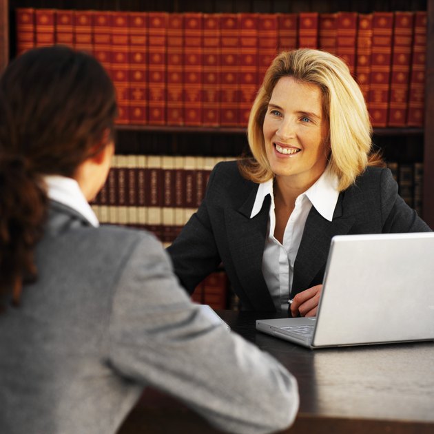 Close-up of two business colleagues having meeting