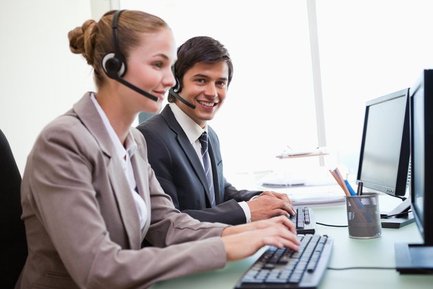 Office workers using computers