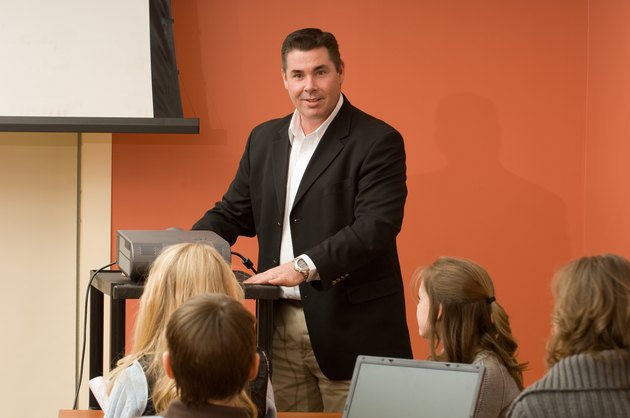 Teacher giving presentation to class