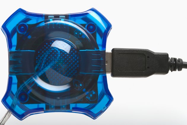 Studio shot of usb quad port hub with jack