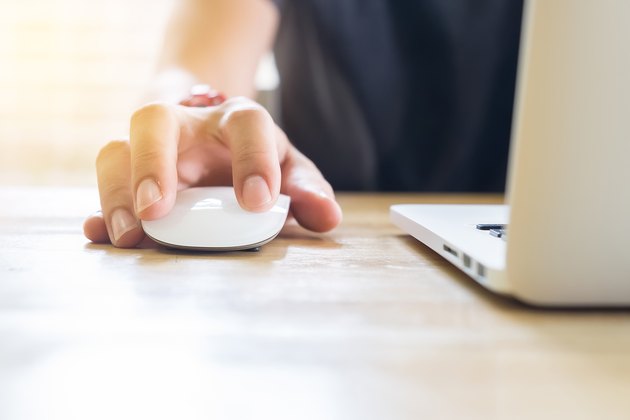 close up hand business man using mouse