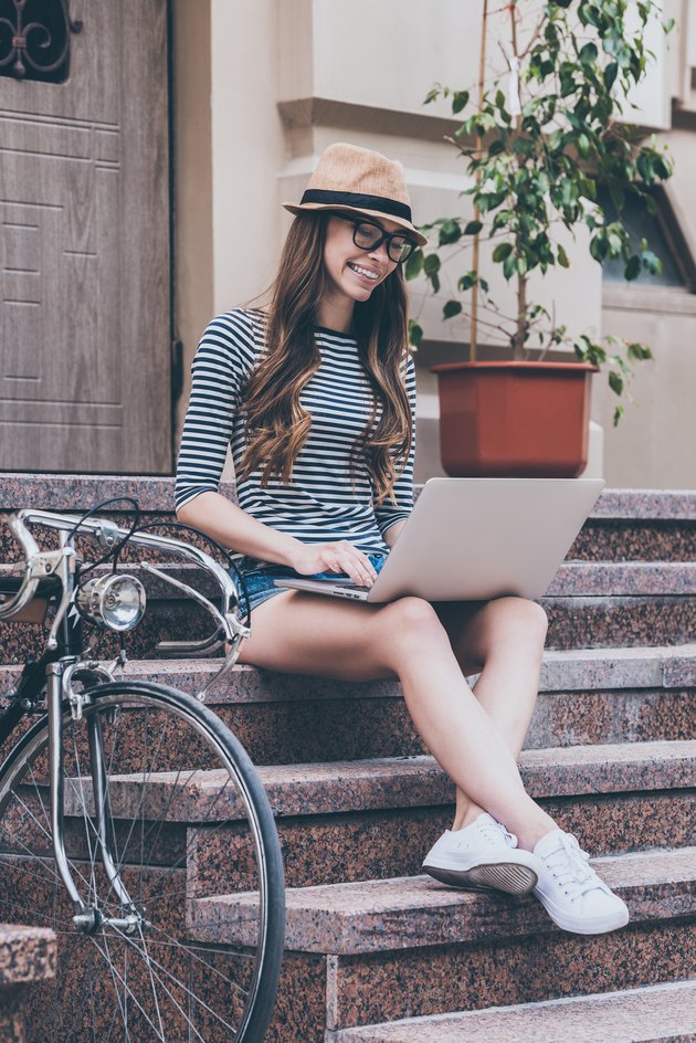 Surfing web anywhere she wants.