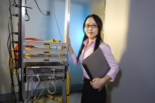 Woman in computer server room