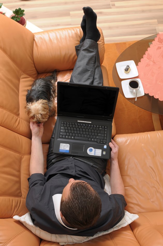 Businessman relaxing on sofaa