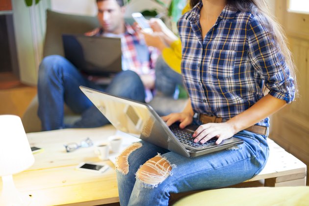 Business people conversation with technology at hand. Exchange o
