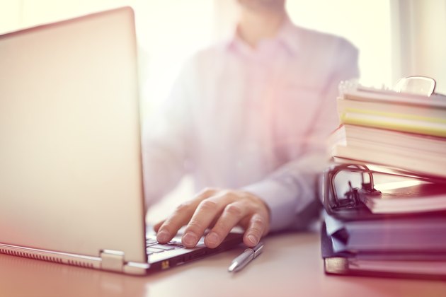 Businessman using laptop computer