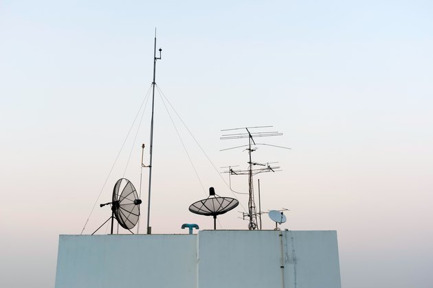 Satellite Dishes and TV antennas on skyscraper