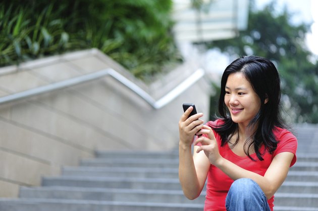 young asian use smartphone