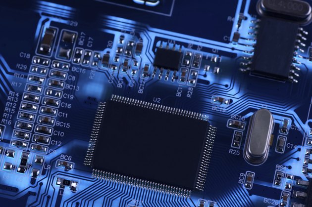 Macro photo of electronic circuit. PCB on the lighting.