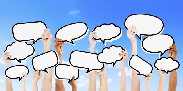 Empty Speech Bubbles Raised Outdoors
