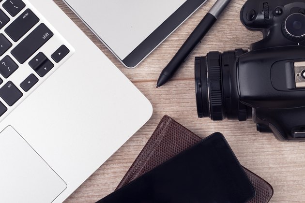 Photographerâs of graphic designerâs workplace