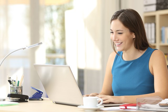 Entrepreneur working with a laptop at office
