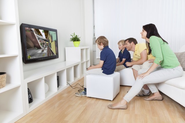 Young family playing videogames