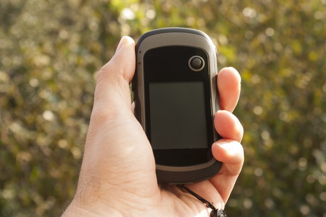 Handheld GPS transmiter in nahd on nature