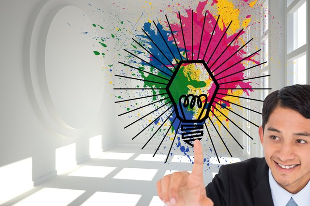 Composite image of smiling asian businessman pointing