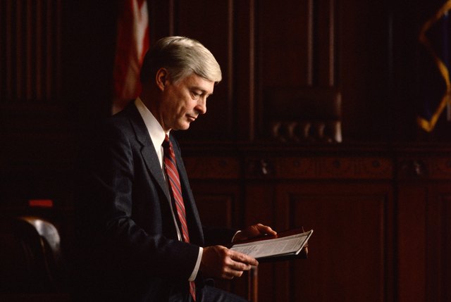 Lawyer reading paperwork