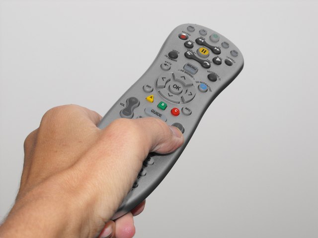 hand holding remote control