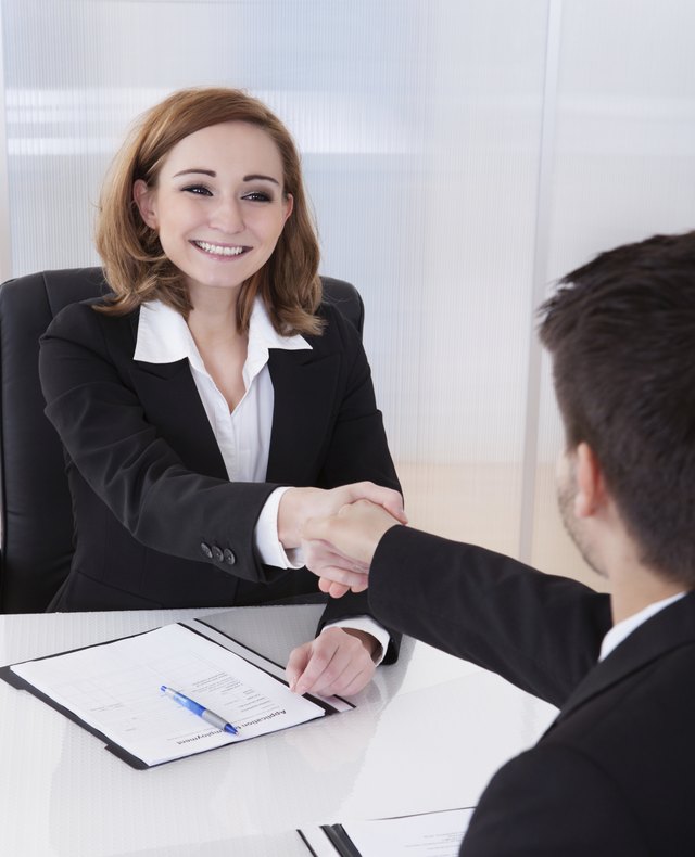 Two businesspeople talking with each other