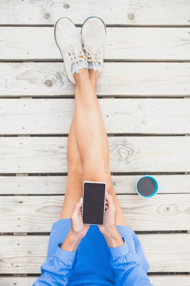 Young woman using smart phone