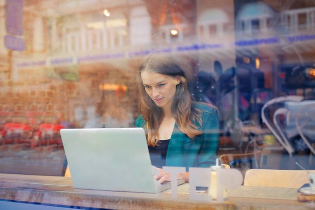 young woman working on laptop