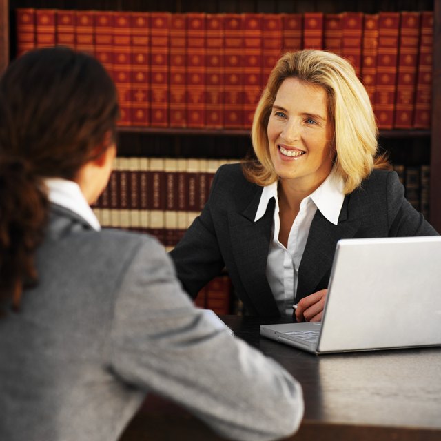 Close-up of two business colleagues having meeting