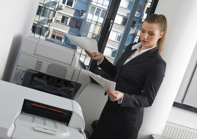 business woman next to office printer