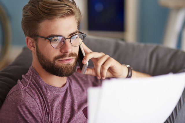Handsome businessman working at home
