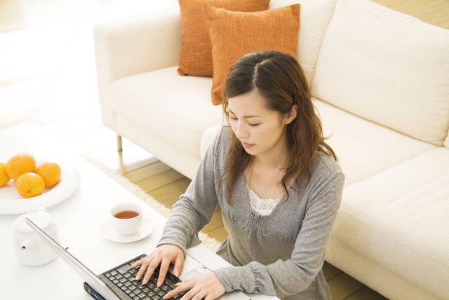 Woman using her laptop