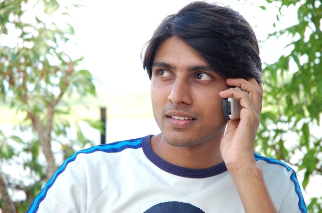 Young man talking on phone