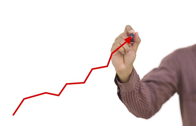 Businessman draws chart